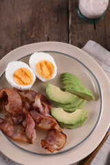 Poster - Breakfast with bacon, eggs and coffee on a wooden table