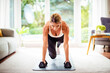 © gzorgz - Woman training alone at home