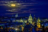 Fototapeta Nowy Jork - A full moon above czech National museum in Prague. 