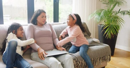 Sticker - Tired and stressed woman using her laptop and being disturbed by her kids. Energetic sibling sisters joining their mother on the couch. Mom needs privacy and alone time while using the internet