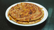Puranpoli on the occasion of Holi Festival also known as Holige, is an Indian sweet flatbread. Puran puri, Puran poli, Holige, Obbattu, or Bobbattlu, is a traditional Indian sweet.