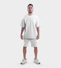 White Sportswear Mockup, Oversized T-shirt, Shorts On A Guy With A Beard, In Sneakers, Empty Clothes For Design, Front View.