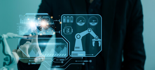 Wall Mural - engineer control automated robot arm machine in factory,smart visual interface screen artificial int