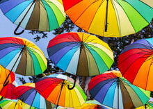 Multicolored Umbrellas Hanging Above Street In Istanbul In Sunny Day And Blue Sky