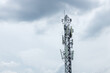 © kanpisut - Communication tower top. Radio antenna Tower , microwave antenna tower on light sky background. wireless technology concept. communication development concept. image for objects and article.