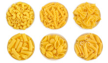 Raw Italian Pasta In Ceramic Bowl Isolated On White Background. Top View. Flat Lay. Set Or Collection