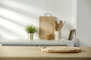Wall Mural - wooden desk in kitchen and wall with shadows.