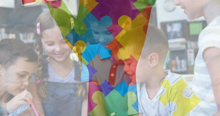 Poster - jigsaw puzzle and hand icon against diverse group of students using digital tablet at school