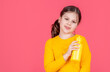 © be free - smiling kid hold water bottle on pink background