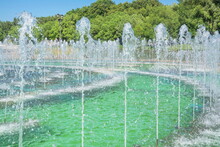 Fountain Water Jets In A Summer City Park