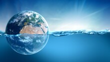 Planet Earth Submerged And Floating In Water. Concept 3D Illustration Of Global Warming And Rising Sea Level In Climate Change Due To Man-made Carbon Emissions. Blue Ocean Background And Sinking Globe