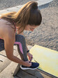 Close-up of an athlete tying her laces.get ready to start exercising or running.healthy lifestyle concept.