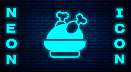 Sticker - Glowing neon Roasted turkey or chicken icon isolated on brick wall background. Vector