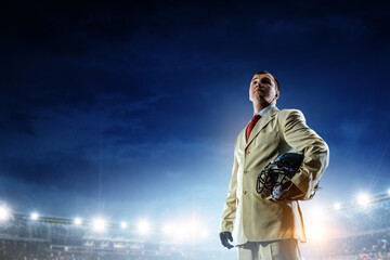 Wall Mural - Businessman acting as american football players