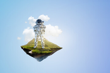 Wall Mural - spaceman on a light bulb