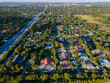 Beautiful aerial view of the miami suburbs and buildings in the sunset