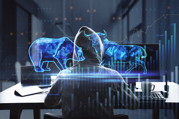 Poster - bulls and bears struggle. Equity market illustration. Back view of hacker using computers at desktop with coffee cup and creative hologram and graph on blurry office interior background