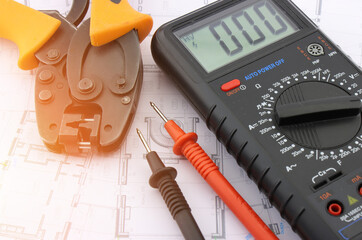 Electrical tools and materials for the installation of an electrical panel on an electrical diagram.