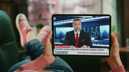 Point of View First Person Using Tablet Computer Watches Mock-up Television Channel Live TV News Program. Anchors Talking, Reporting, Analyzing Events. Mock-up Network Television Channel Mock-up