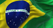 Close-up view of the Brazilian national flag waving in the wind.