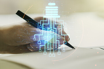 Poster - Creative light bulb illustration with microcircuit and man hand writing in diary on background, future technology concept. Multiexposure