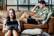 © whyframeshot - home isolate quarantine,asian and caucasian marry couple sit relax using laptop and tablet social media internet surf or shopping online purchase in living room home interior background