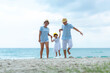 © freebird7977 - Happy family summer sea beach vacation. Asia young people lifestyle travel enjoy fun and relax leisure destination in holiday. Travel and Family Concept