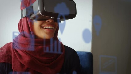 Poster - Animation of digital icons over biracial woman in hijab wearing vr headset
