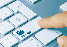 Gas Tax - Inscription On Blue Keyboard Key.