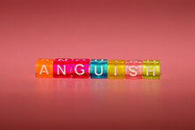 The Word "anguish" Made Up Of Cubes