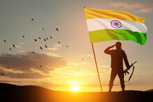 Silhouette Of Soldier With India Flag And Flying Birds On A Background The Sunset Or The Sunrise. Greeting Card For Independence Day, Republic Day. India Celebration.