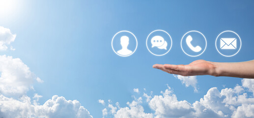 Businessman hand holding,pressing on icon phone, mail, telephone,message,post and person,user. Customer service call center contact us concept.Banner,copy space.Contact Methods.