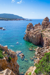 Wall Mural - Clear water and rocks in Costa Paradiso