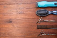 Some Grooming Tools On Wooden Background