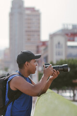 photographer walking through streets of Santa Cruz de Tenerife