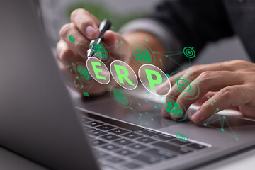Fototapete - ERP (Enterprise Resource Planning) design is examined by an IT manager: ERP (Enterprise Resource Planning) Productivity and Improvement Concept.
