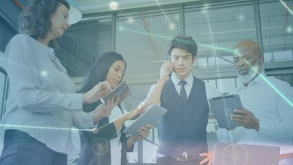 Canvas Print - Animation of network of connections over diverse female and male coworkers in office