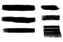 Pincel De Pintura Plana Negra De Diferentes Tamaños Sobre Fondo Blanco Liso Y Aislado. Vista De Frente Y De Cerca. Copy Space