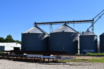 Canvas Print - Grain Bins at an Elevator by Railroad Tracks