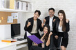 © Wongsakorn - Yes! Businesspeople triumphing because of the financial growth of company. Happy smiling businesspeople triumphing with raised fists.