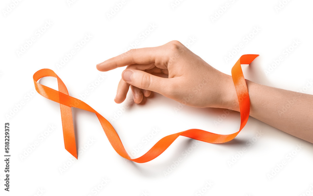 Woman with orange awareness ribbon on white background. Kidney cancer concept