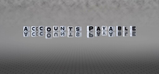 Wall Mural - accounts payable word or concept represented by black and white letter cubes on a grey horizon background stretching to infinity