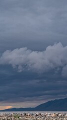 Wall Mural - Dark clouds following a rainstorm moving over Utah Lake looking south towards West Mountain from Provo Boat Harbor.