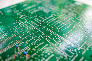 Fototapete - Old computer chips that are out of order. Not working microshops with transistors, chips and conductors. Blue system board with microchips and transistors