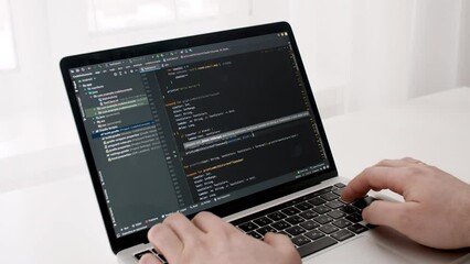 Coding on the screen, HTML encoding and programming on a laptop screen, developer, web development. Computer Web Developer. Cloud data social network media or virus. High quality 4k footage