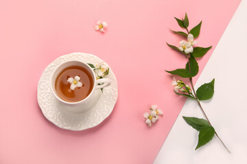 Wall Mural - Jasmine tea on color background.