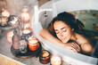 © Mariia Korneeva - Beautiful woman relaxing at spa. Young lady relaxing in jacuzzi.