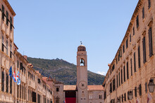 Stradun Is The Main Shopping Street And Gathering Area In The City Of Dubrovnik In Croatia. Image With No People. Blue Sky With Copy Space.