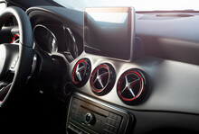 Dark Luxury Car Interior - Steering Wheel, Shift Lever And Dashboard. Car Inside. Beige Comfortable Seats, Steering Wheel, Dashboard, Climate Control, Speedometer, Display.