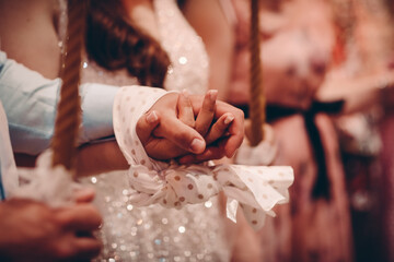 Wall Mural - bride and groom hands